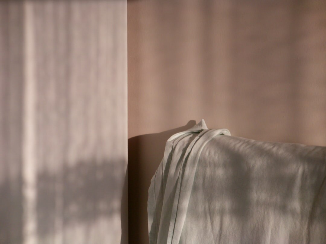 person journaling in morning sunlight