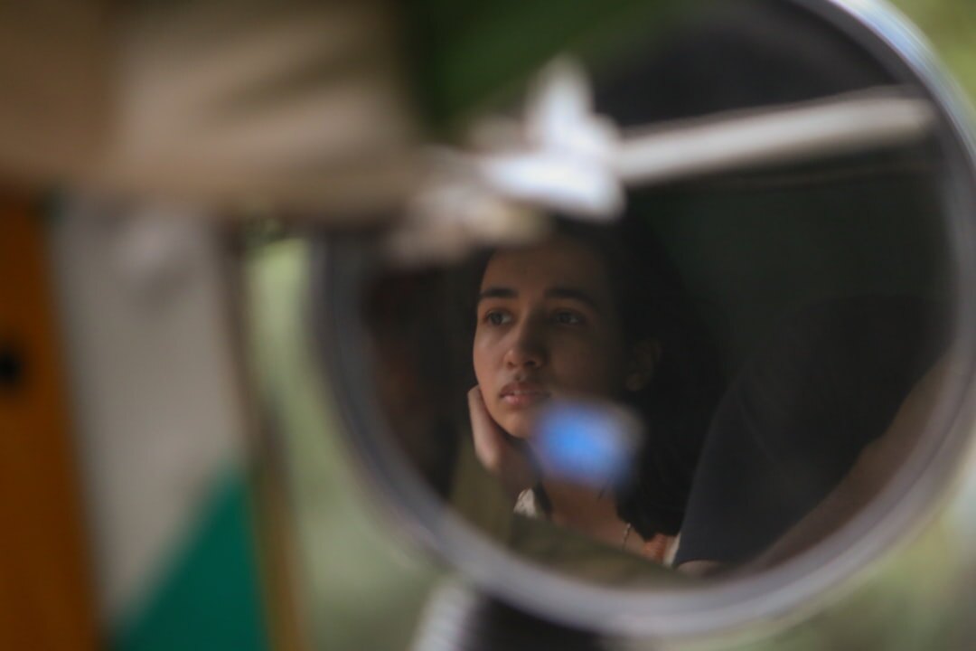 woman practicing speech in mirror