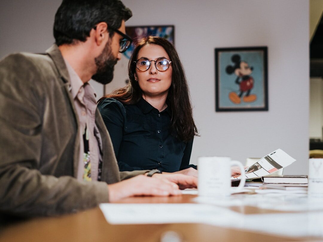 people having conversation in office
